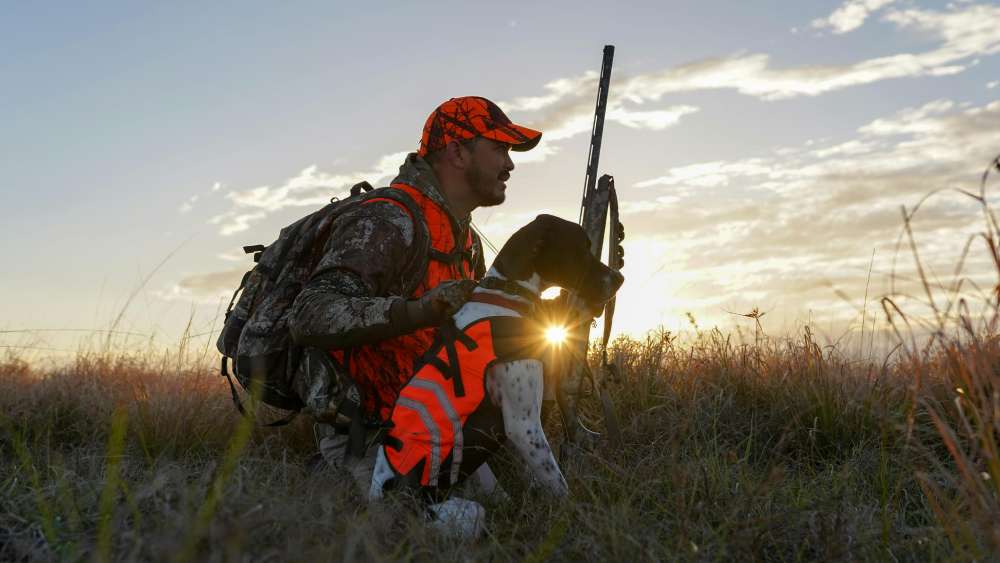 A hunter with his dog